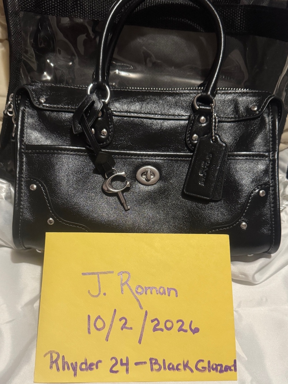 Coach Rhyder 24 satchel in Black Glazed Leather